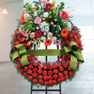 corona funebre garofani rossi Roma consegna 2-3 ore